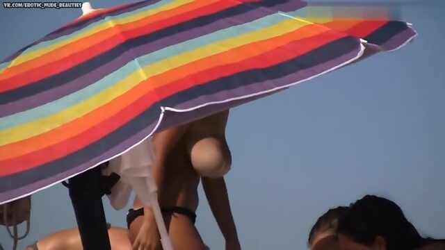 Huge tits topless beach